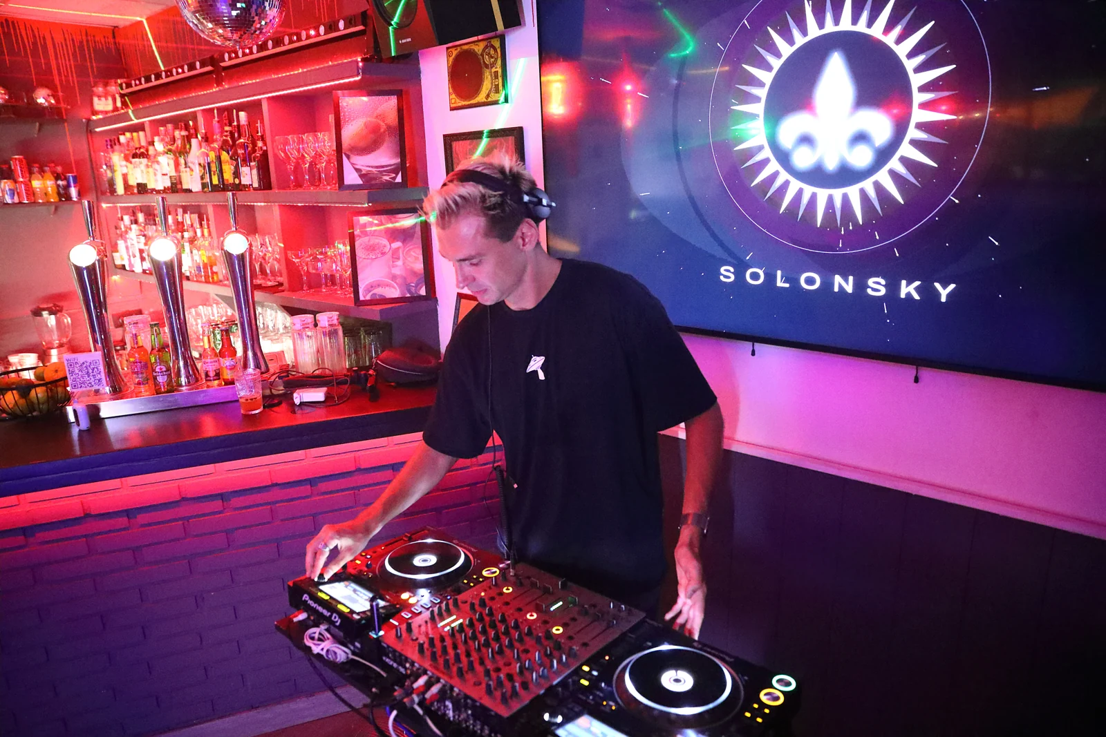 SOLONSKY concentrating on a mix